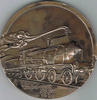 Médaille presse papier en bronze, année 1987. Signée C. Gondard. et J.G Cumont.