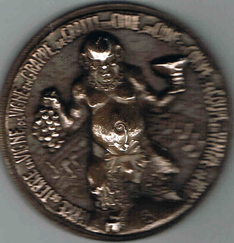 Médaille presse papier en bronze année 1973, poinçon sur la tranche, verso représentant les inscripion, A lagloire des vins de France.