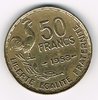 Pièce 50 Francs 1953. G. Guiraud. Description: 50 Francs millésime encadré des différents; coq debout à droite au-dessus d'une branche de laurier vers la gauche.