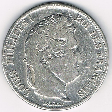 Pièce de monnaie française 5 francs IIe type Domard argent émise en 1834Q. Description: Tête à droite de Louis Philippe 1er coiffée d'une couronne de chêne.