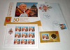 Timbres poste du Vatican. Floder avec une mini feuille de 9 timbres + une enveloppe philatélique et la Coin Card N° 4 composé d'une pièce de 50 cent à l'effigie du Pape Jean-Paul II au millésime 2013.