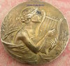 Médaille ancienne pendentif femme jouant de la harpe